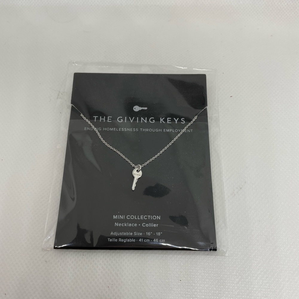 The Giving Keys mini key necklace -silver says “believe”